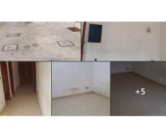 Un appartement de 02 CHAMBRES un SALON Sanitaire dallée staffé