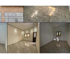 Un appartement neuf dune Chambre avec un salon