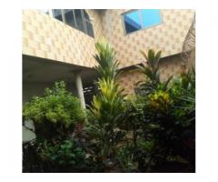 À vendre une *villa R+1* avec TF à Gbodjè 100m du goudron
