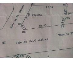A VENDRE Parcelle à gbegnigan, en angle de rue, au bord de voie de 15 mètres.