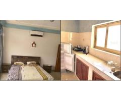 Appartements composé de 2 Chambres salon meublée + 2 salle d'eau avec une cour personnelle